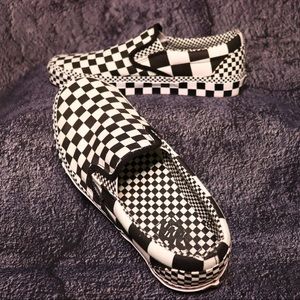 Vans All Over Checkerboard Classic Slip Ons